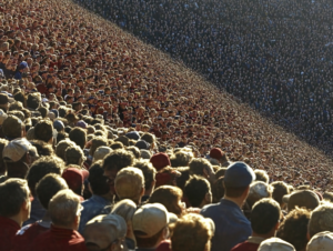 Crowd looking at distance hoping to sell the team