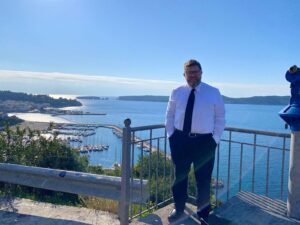 George staning next to obsrevation point overlooking Navarino Bay