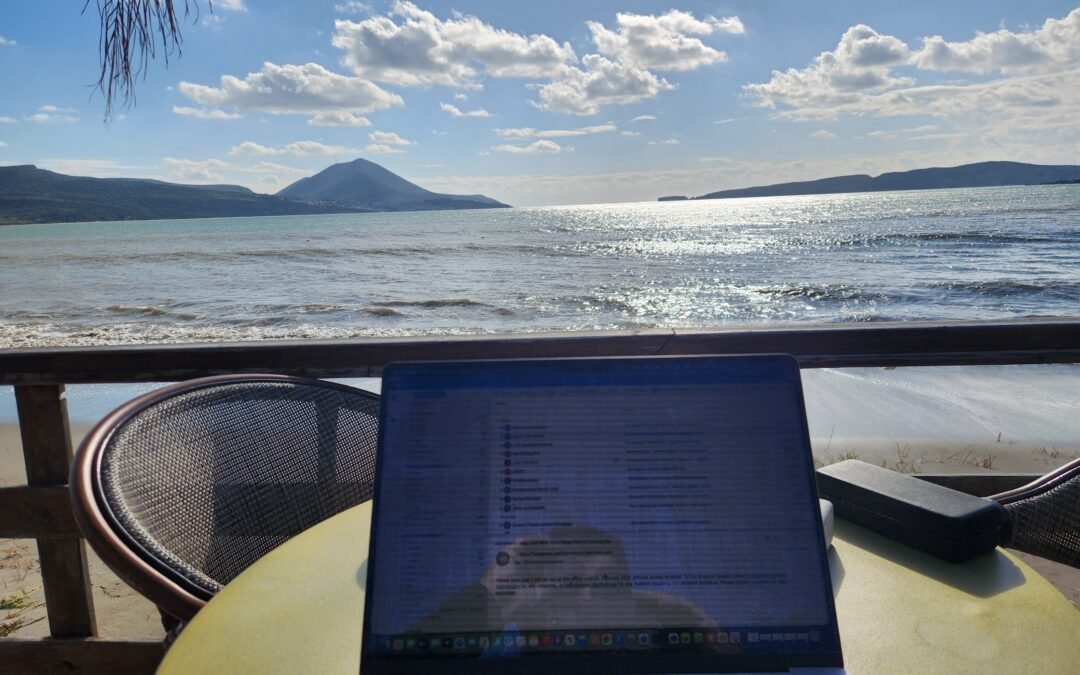 real image of cafe where we sat. you see my laptop on table with Ionian Sea and town of pylos in background