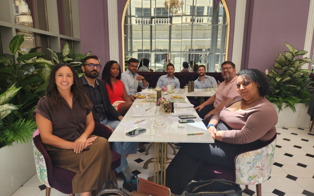 SBC MA event on Thursday 14 May. table with 8 people facing the camera in a beautiful setting