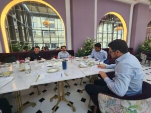 participants at today's meeting.. people around a table with space to talk and meet