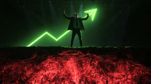 a hero touting higher numbers with a big green arrow on black background but standing over a cliff with red lava showing weak foundation